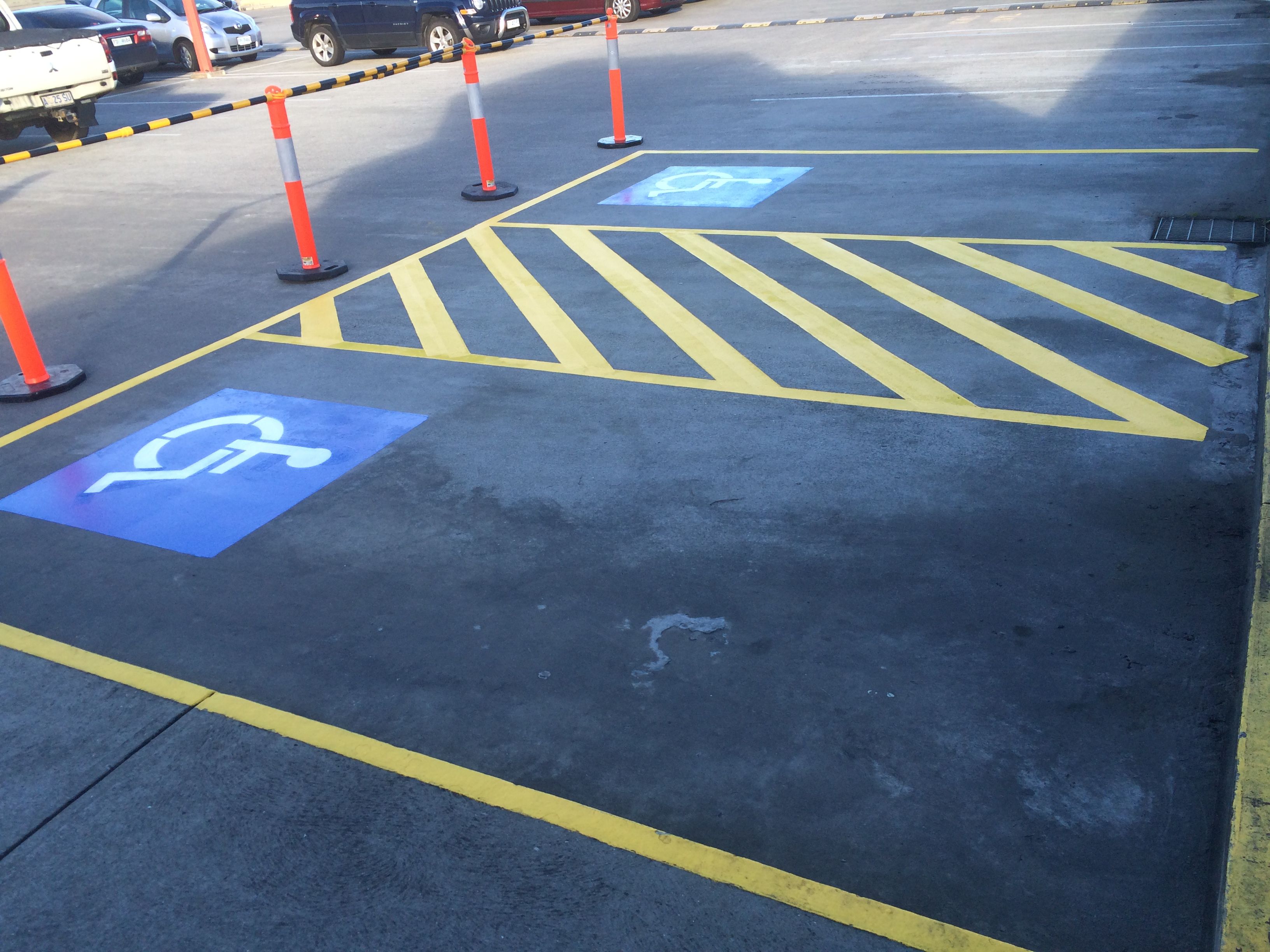 car parking spaces with handicap logo
